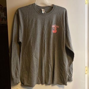 Women gray long sleeve t-shirt with pink guitar on it